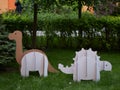 Dinosaur Ankylosaurus and Brontosaurus made of cardboard. Idea for the birthday party, dino party or photo session.