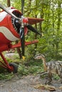 Dinosaur and biplane Royalty Free Stock Photo