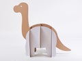 Dinosaur Brontosaurus made of cardboard. Idea for the birthday party, dino party or photo session