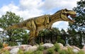 Dinosaur figure in park latvia Royalty Free Stock Photo