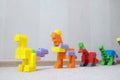 Dinosaur figurines made with plastic constructor block kit toys Royalty Free Stock Photo