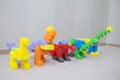 Dinosaur figurines made with plastic constructor block kit toys Royalty Free Stock Photo