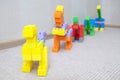 Dinosaur figurines made with plastic constructor block kit toys Royalty Free Stock Photo
