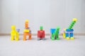 Dinosaur figurines made with plastic constructor block kit toys Royalty Free Stock Photo