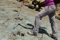 Dinosaur print fossils in Maragua Crater. Bolivia with hiker
