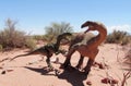 Dinosaur model in the sand Royalty Free Stock Photo