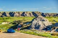 Vehicles in the parking lot at Dinosaur Provincial Park