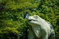 Dinosaur sculpture in a public park