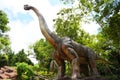 Dinosaur statue in the forest park - Diplodocus , Mamenchisaurus