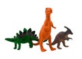 Plastic toy dinosaurs figurines isolated on white background. Royalty Free Stock Photo