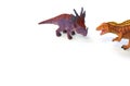 Dinosaurs toys on white background. Royalty Free Stock Photo