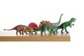 Dinosaurs walking off a ledge