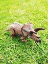 Dinosaurus toy on the grass