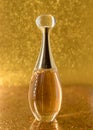 Dior perfume gold bottle close-up macro texture abstract light
