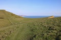 A dip in the hillside near Seatown in Dorset, situated on the coastal path on the Jurassic coast between Charmouth and West Bay