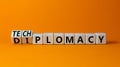 Diplomacy or techplomacy symbol. Turned wooden cubes and changed the concept word diplomacy to techplomacy. Beautiful orange