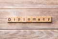 Diplomacy word written on wood block. diplomacy text on wooden table for your desing, concept Royalty Free Stock Photo