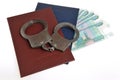 Diplomas of higher education and money with handcuffs isolated Royalty Free Stock Photo