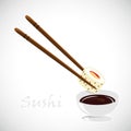 Dipping sushi in soy sauce Royalty Free Stock Photo