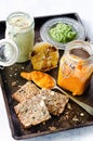 Dips and spread with seeded bread as a snack