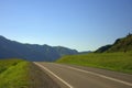 A direct asphalt road goes through the flight valley towards the mountain ranges