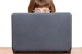 Direct view of girl with glasses reads from laptop