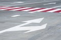 Direction arrows and crosswalk on a brand new highway concrete road. New roadway with directional signs Royalty Free Stock Photo