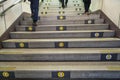 Direction arrows on steps on Tokyo subway Royalty Free Stock Photo