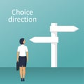 Direction choosing. Businesswoman standing sign with arrows