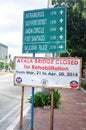 Direction guide signpost beside road on street for filipino people and foreign travelers travel journey and read looking at