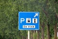Direction sign in blue and white heading parking and petrol station De Vink along the  A20 Royalty Free Stock Photo