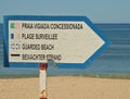 Direction sign - Guarded beach