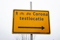 Direction sign to a corona test location