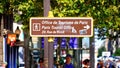 Direction sign to the tourist office on Paris - CITY OF PARIS, FRANCE - SEPTEMBER 04, 2023 Royalty Free Stock Photo