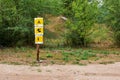 Direction sign on the trail in the forest, where there is a camping, lake, walking path for the tourist