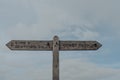 Direction signs along the coastal South West Coast Path route on Jurassic Coast, UK