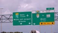 Direction signs To Miami International Airport and Orlando on the highway - MIAMI, FLORIDA - FEBRUARY 14, 2022