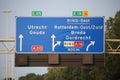 Direction and speed sign above motorway A20 at the Terbregseplein with split to the south of Rotterdam via A16 and E19