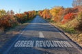 Direction to the Green Revolution on a Country Road with Autumn Colors
