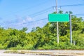 Directional green blank empty road sign in Tulum Mexico Royalty Free Stock Photo