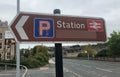 Directional Road Sign Directing Traffic to the Train Station Car Park