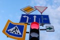 Directional road signs close-up over blue sky Royalty Free Stock Photo