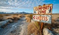 Directional road signs with COMFORT ZONE and SUCCESS against a barren desert landscape, symbolizing the journey and choices Royalty Free Stock Photo