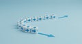 Directional Shift: Navigating Change with Arrow Cubes on Blue - Growth & Strategy