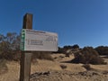 Directional sign in nature protection area Reserva Natural Especial de Dunas de Las Maspalomas in Maspalomas, Gran Canaria.