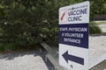 Directional signs on the footpath to show the direction to the entrance of the vaccination centre