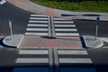 directionally divided lanes at intersection. crossing has a raised safety Royalty Free Stock Photo