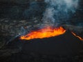 Directly above close up shot of boiling lava inside volcano crater, aerial view