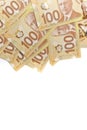 Directly Above Image of Crisp Canadian 100 One Hundred Dollar Bills on a White Background Royalty Free Stock Photo