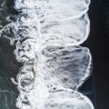 Abstract Nature - White Surf on Volcanic Black Sand Royalty Free Stock Photo